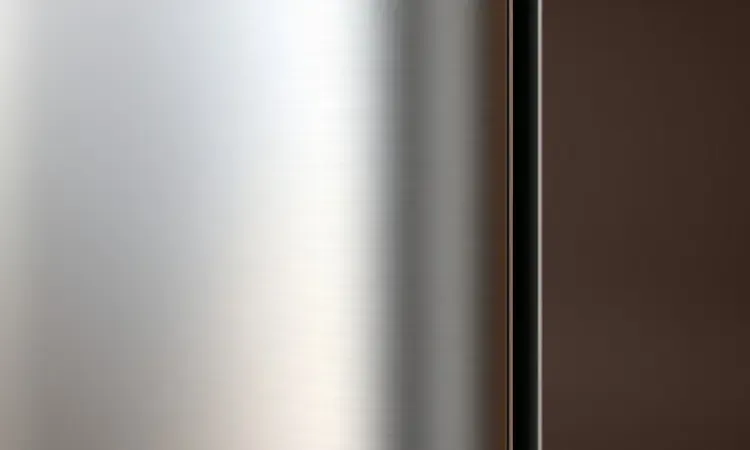 Detalhes de design e acabamento premium de uma fritadeira elétrica moderna com superfícies foscas e elegantes.